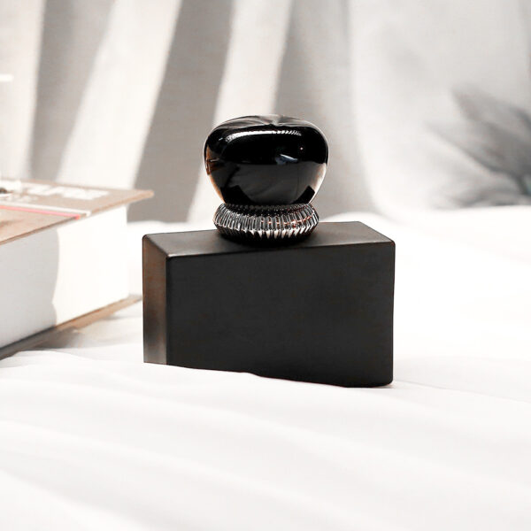 black and gold perfume bottle